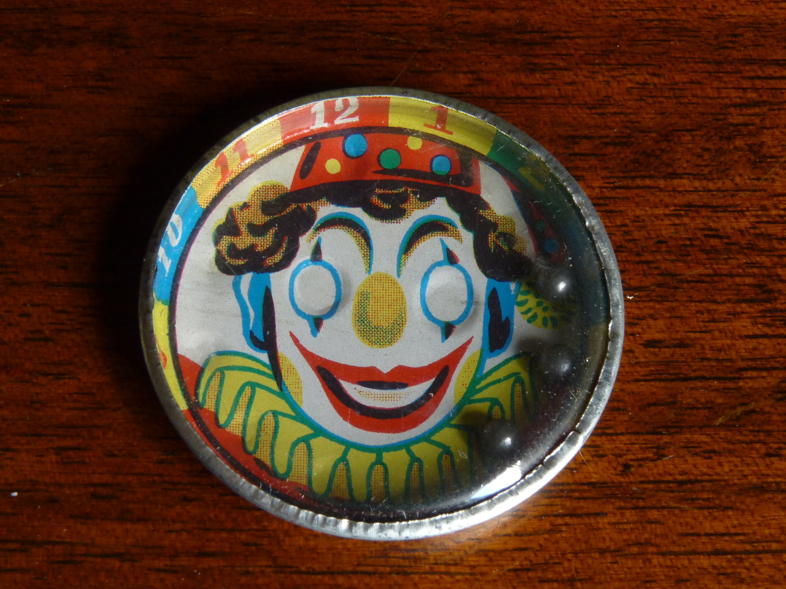 Tin Clown Face Dexterity Puzzle