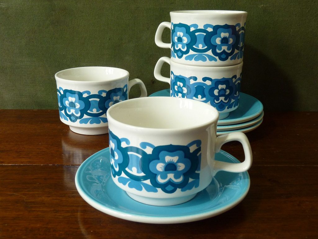Set of four 1970s blue "flower power" cups and saucers by Staffordshire