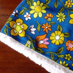 Fab Vintage Towel in Blue with Vivid Coloured Flowers and White Fringeing
