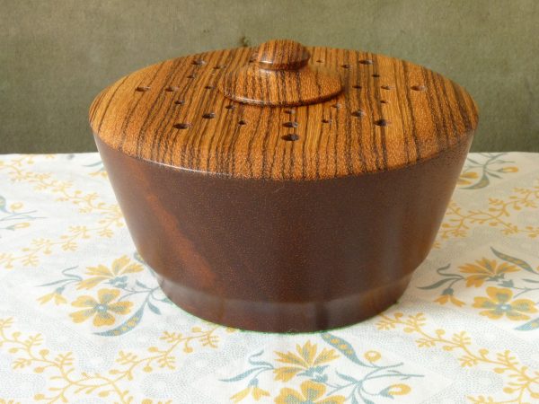 Turned wood pot pourri bowl with contrasting grain