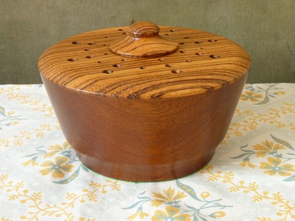 Turned wood pot pourri bowl with contrasting grain