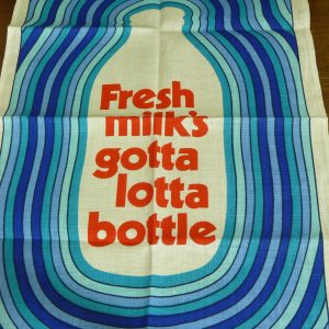 Genuine Northern Fresh Milk's Gotta Lotta Bottle Tea Towel