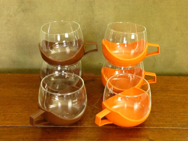 Set of 6 brown and orange "Drink Up" style plastic and glass cups