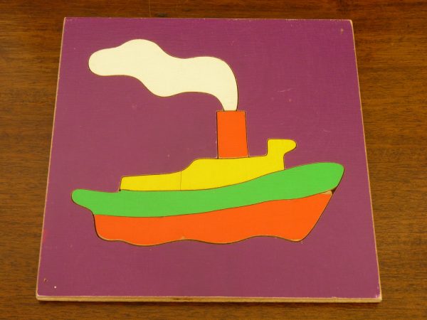 A pair of charming vintage wooden jigsaws made by W. R. Kelly
